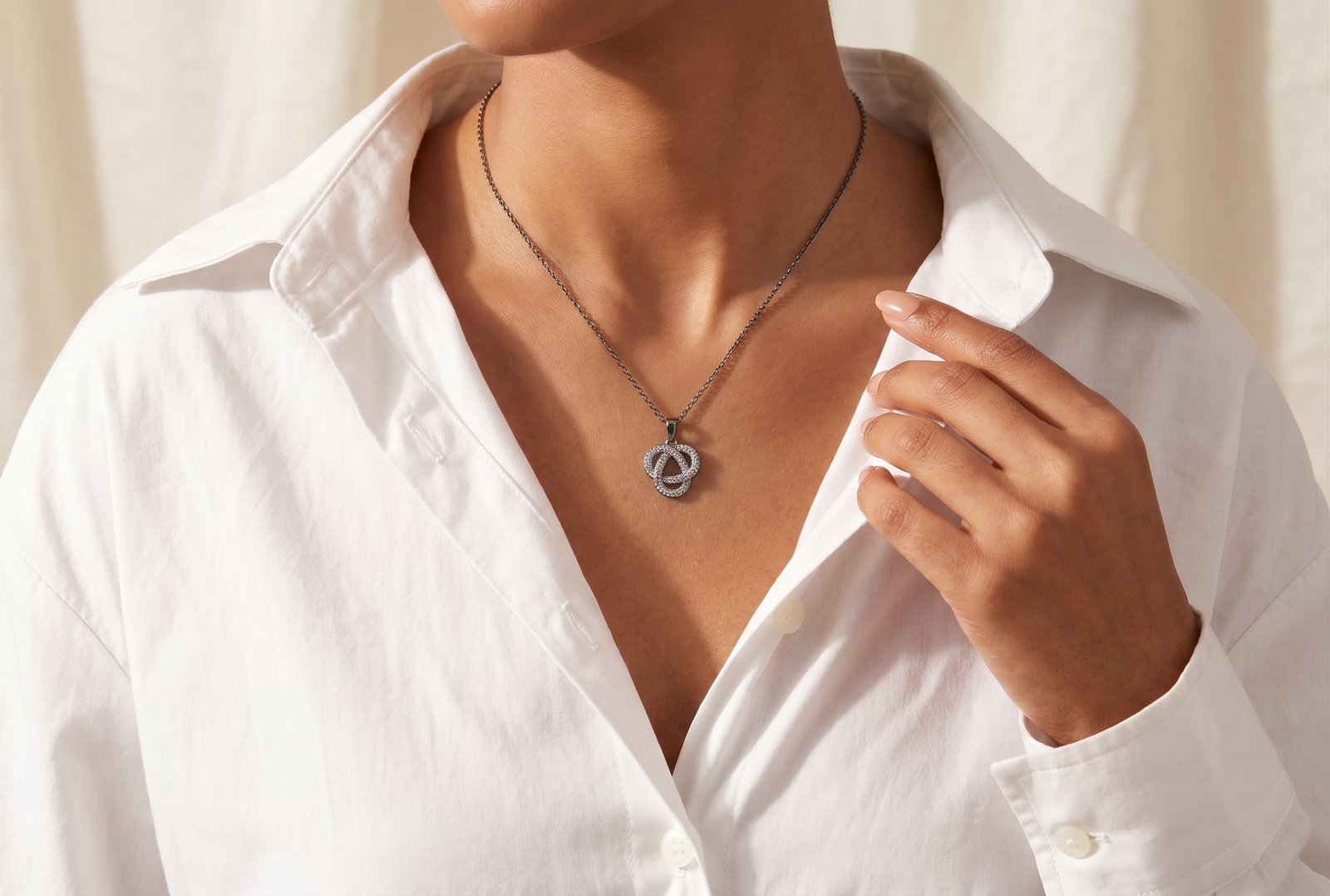 Ties of the Moon — Moissanite Knot Pendant Necklace in Sterling Silver - Image 2